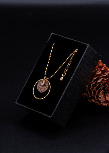 Collier en bois et chaîne